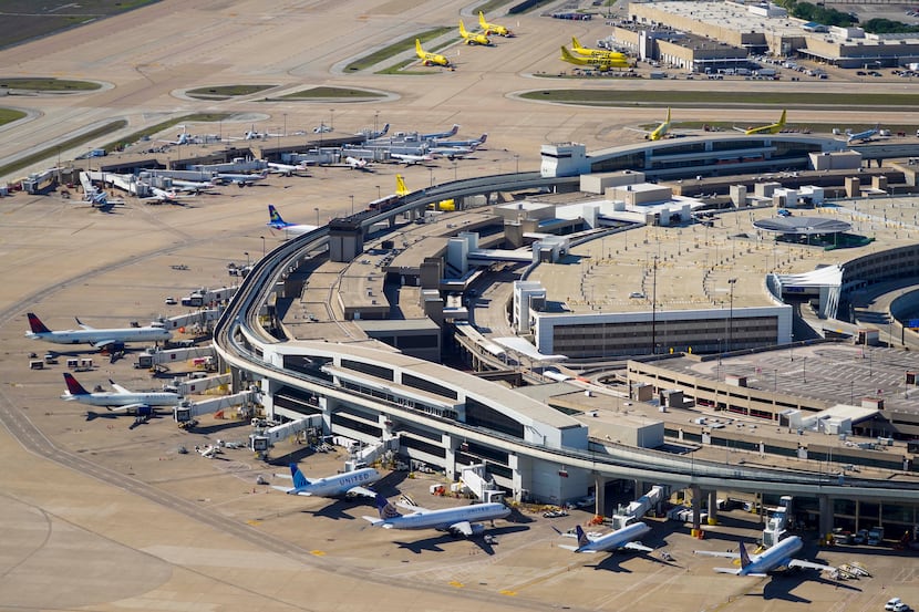 Aerial view of United, Delta and Spirit Airlines aircraft at the gates of Terminal E at...