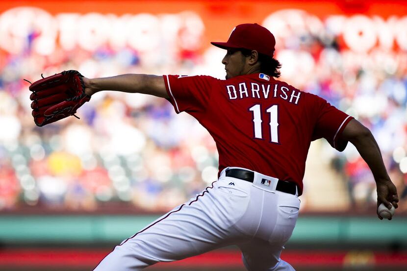 Texas Rangers starting pitcher Yu Darvish pitches during the first inning against the...