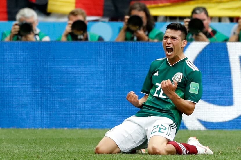 Mexico's Hirving Lozano, celebrates scoring his side's opening goal during the group F match...