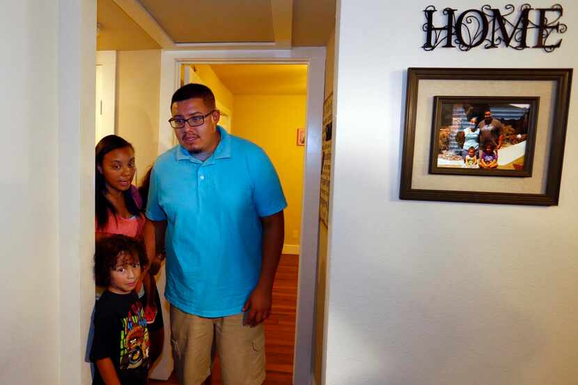 
Leo Perez, his wife, Kimberly and son Martin tour their newly renovated, mortgage-free home...