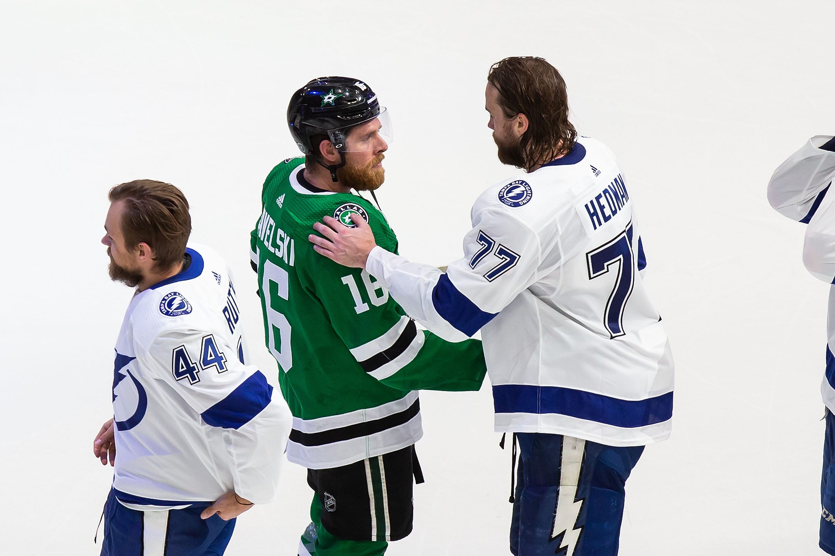 Joe Pavelski (16) of the Dallas Stars congratulates Victor Hedman (77) of the Tampa Bay...