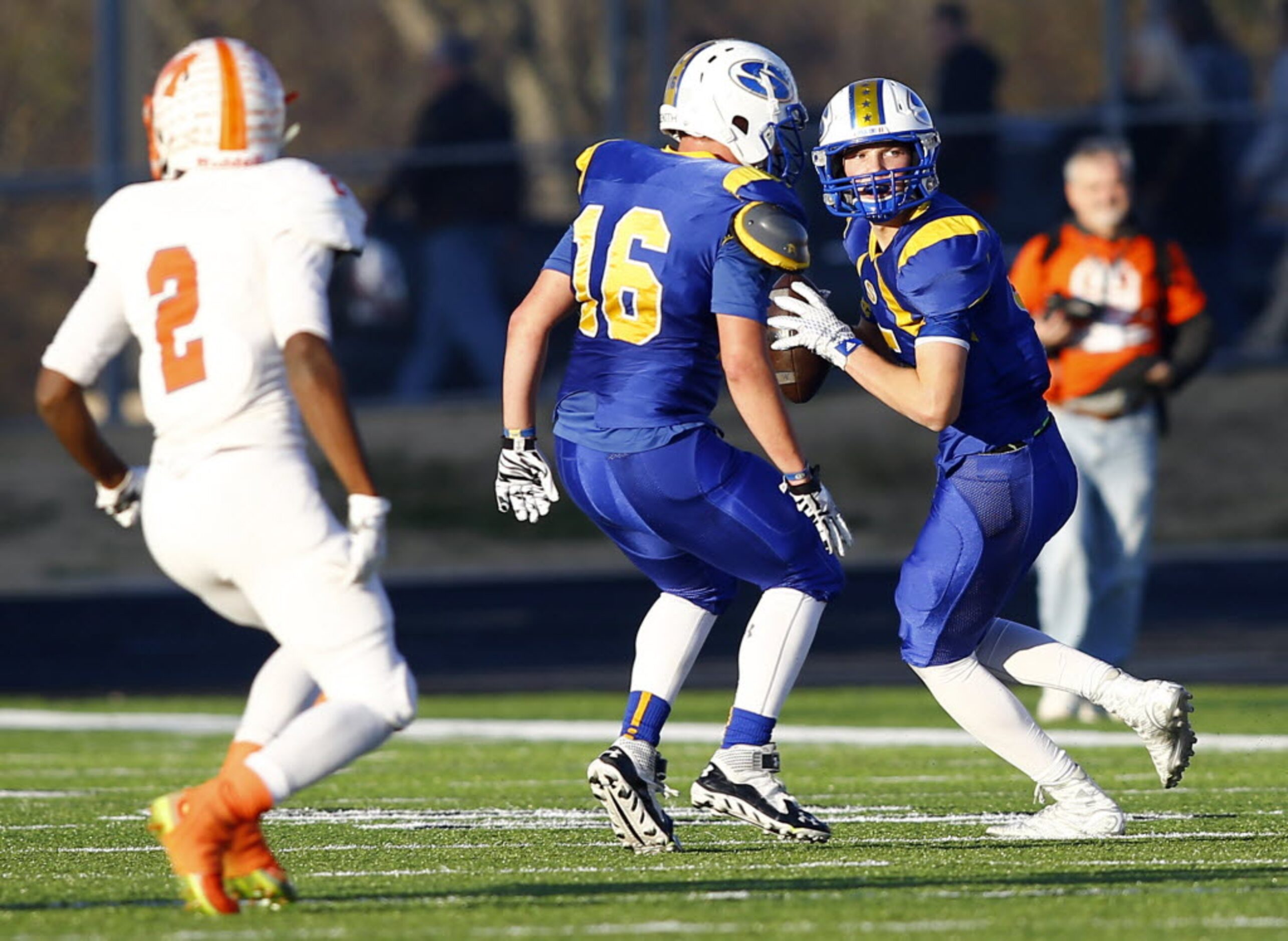 TXHSFB Sunnyvale's Cash Goodhart (5) looks to pass down field on a flea flicker play as Curt...