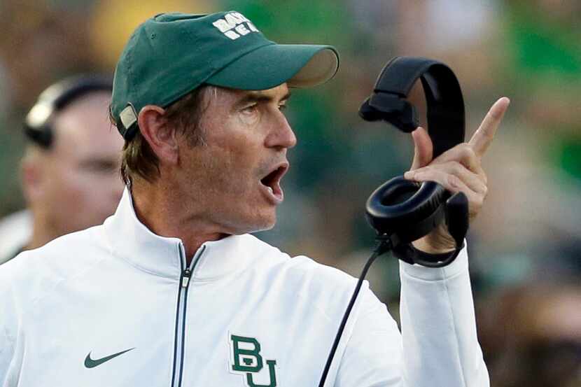 Baylor coach Art Briles yells from the sideline during his last season as the Bears head...
