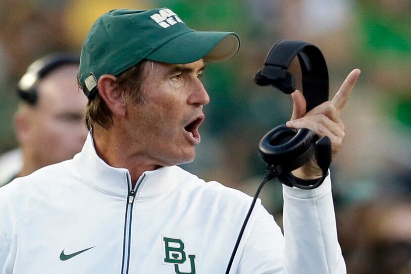 Baylor coach Art Briles yells from the sideline during his last season as the Bears head...