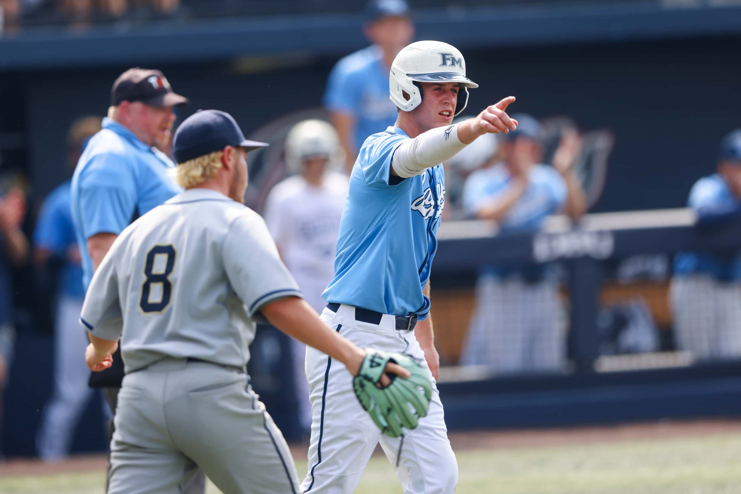 Flower Mound’s Garrett Wallace (1) celebrates after running home during Game 3 of a...