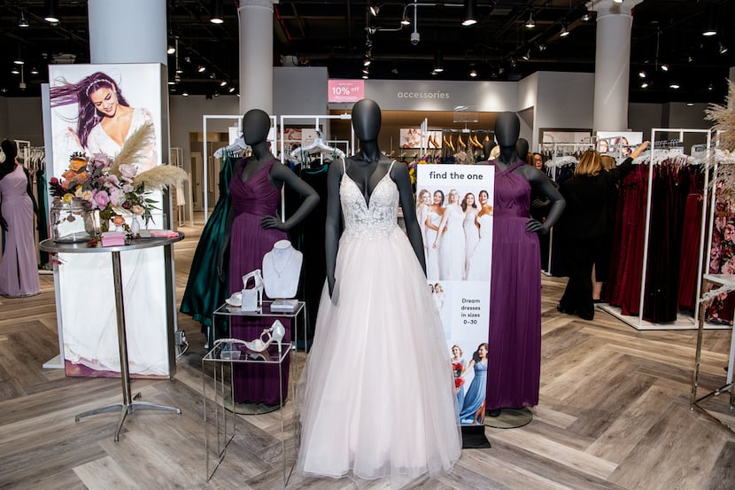 Wedding and special occasion dresses at a David's Bridal store.