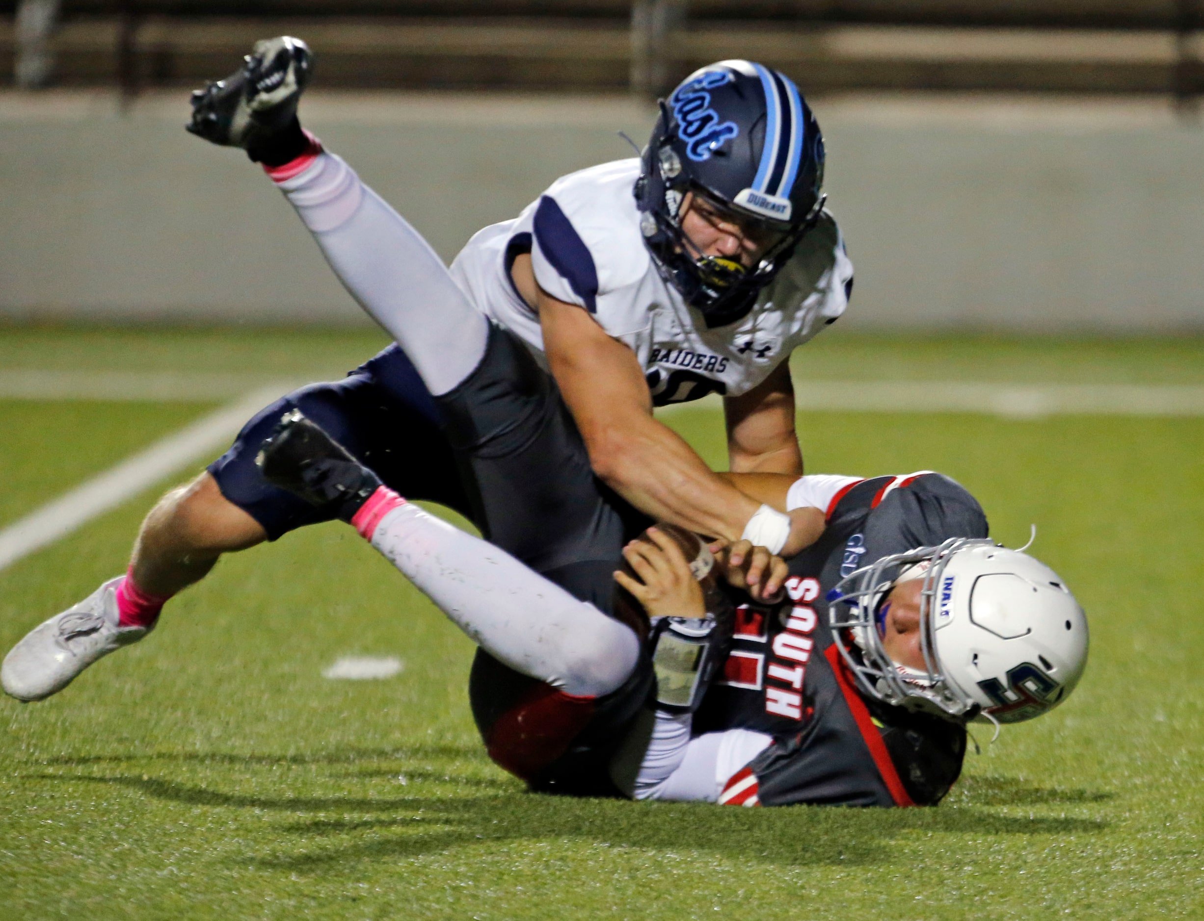 Wylie East high’s Zachari Loftus (19) sacks South Garland high’s Mirko Martos (4) during the...