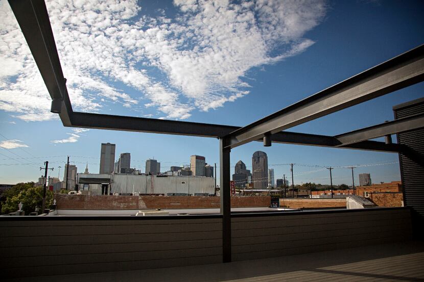 A view of downtown from the bar at the Harlowe MXM development in Deep Ellum. The two...