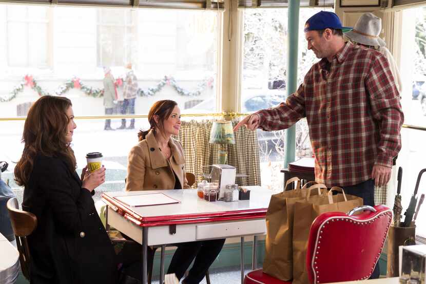 Lauren Graham, Alexis Bledel and Scott Patterson play as Lorelai, Rory and Luke in a scene...