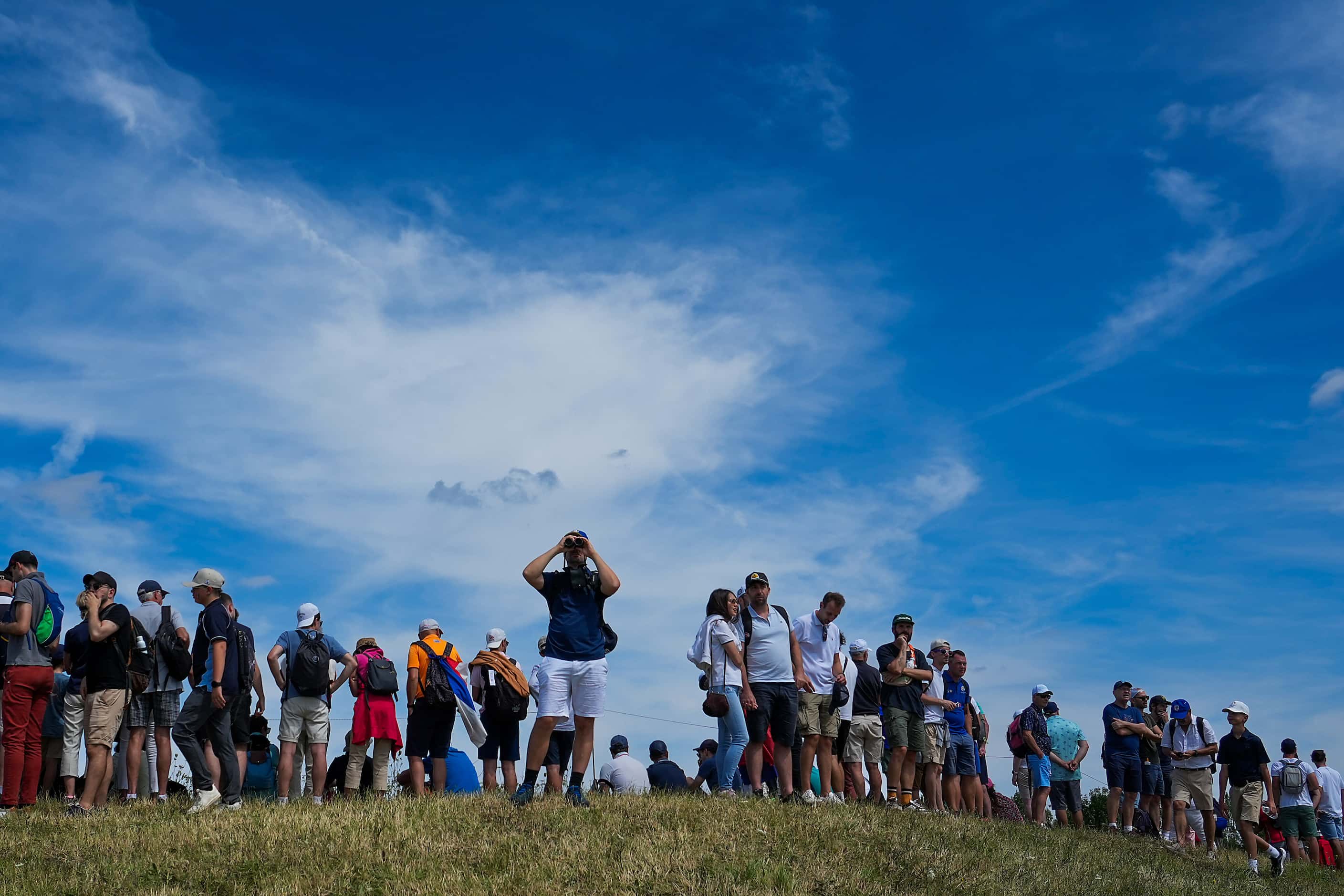 Spectators watch during the final round of men's golf at the 2024 Summer Olympics on Sunday,...