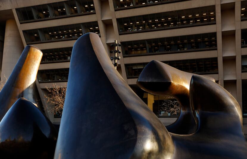 Henry Moore's sculpture "The Dallas Piece" fronts the building. Dallas dedicated the new...