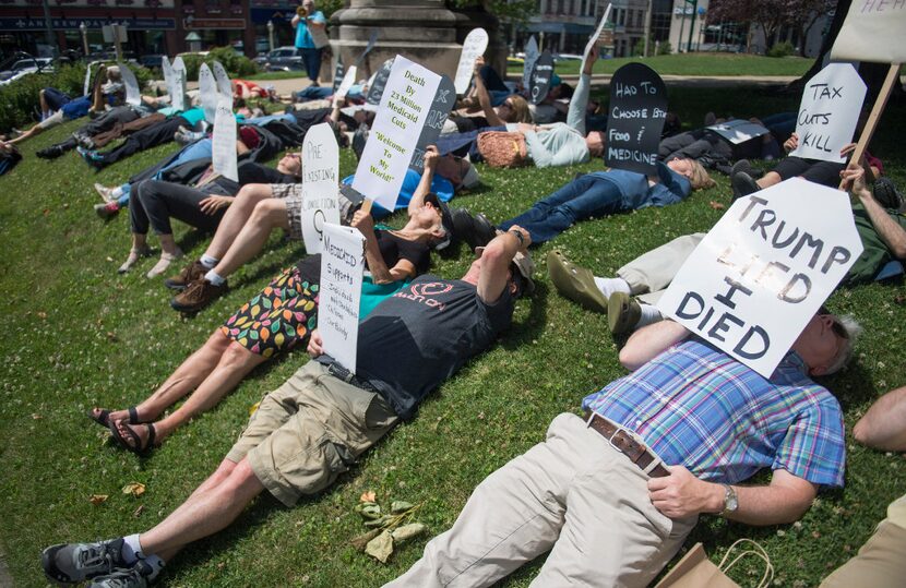 Demonstrators gathered to protest the  health care bill being considered in the Senate by...