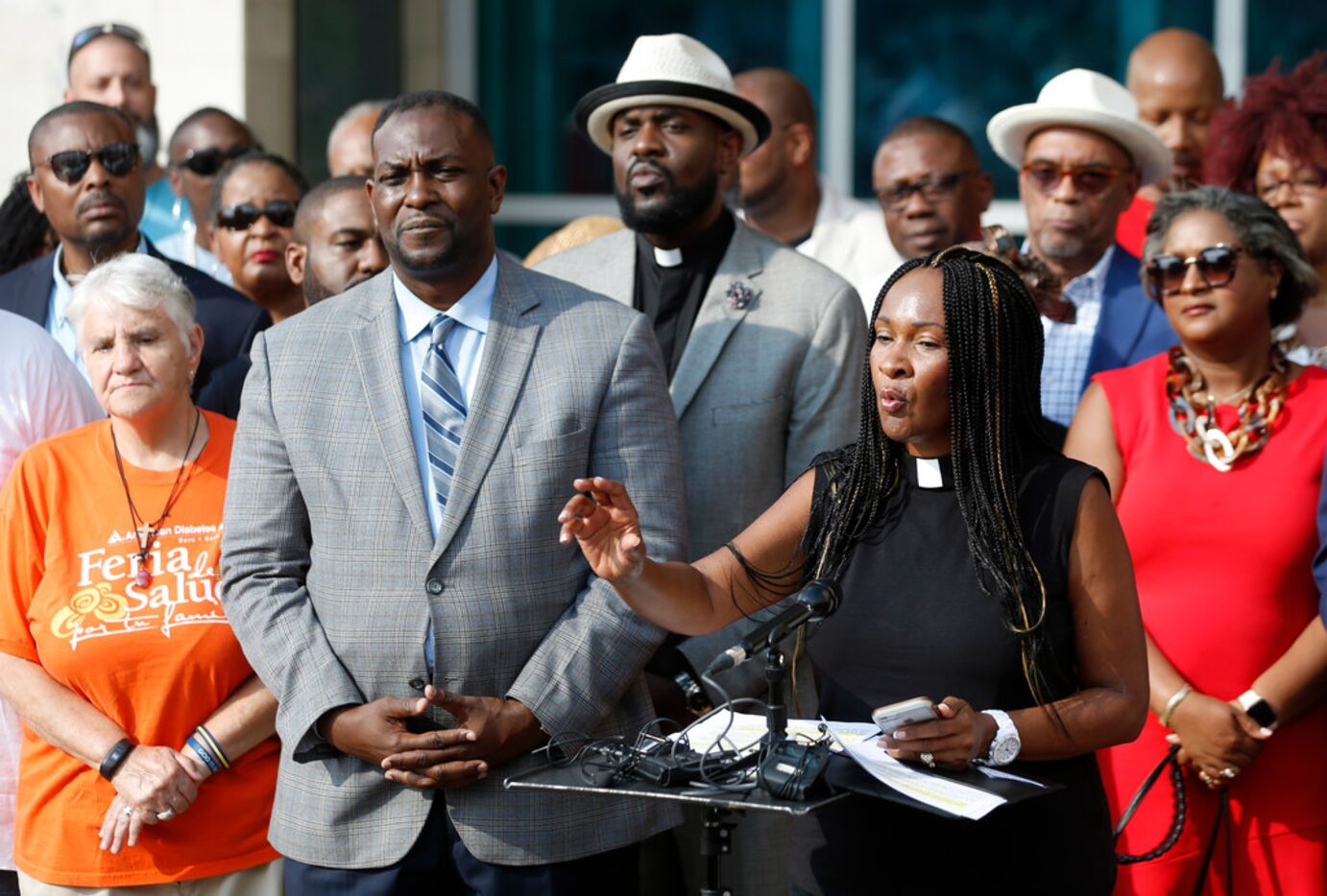 Dr. Sheron Patterson of Hamilton Park United Methodist Church speaks as the African-American...