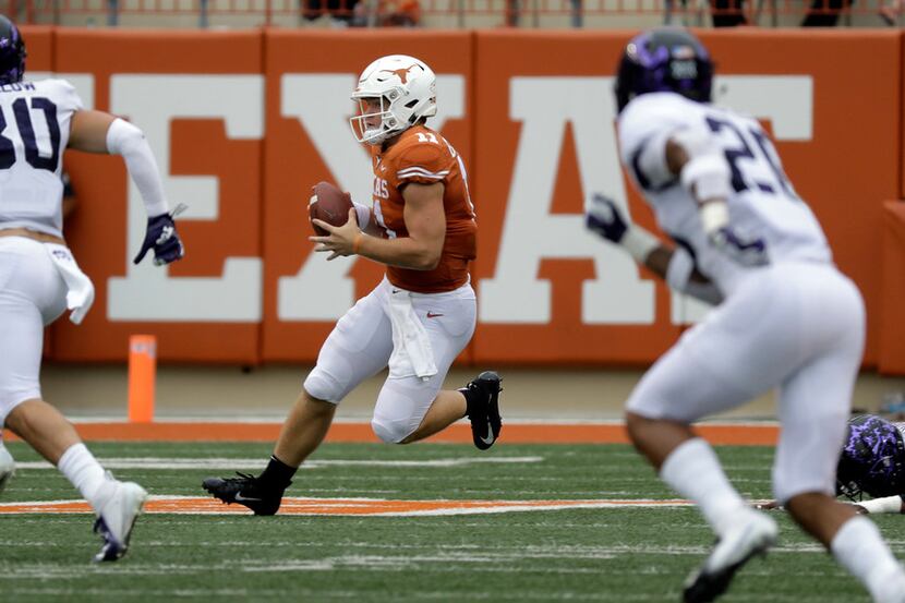 Texas quarterback Sam Ehlinger (11) will be a hard man for the Horned Frogs to stop on...