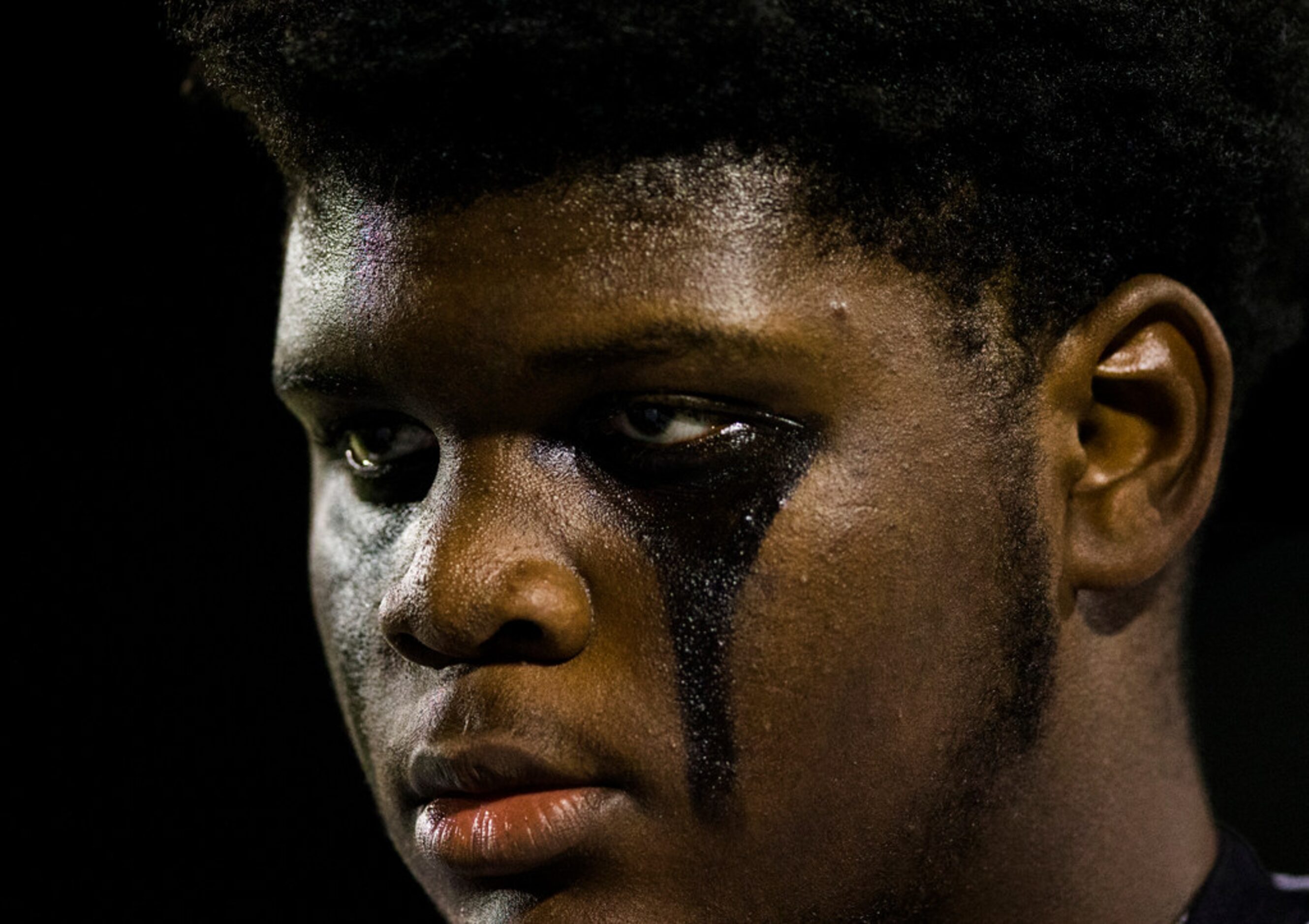 Mansfield Timberview lineman Myles Oyebadejo (95) stands on the sideline before a UIL Class...