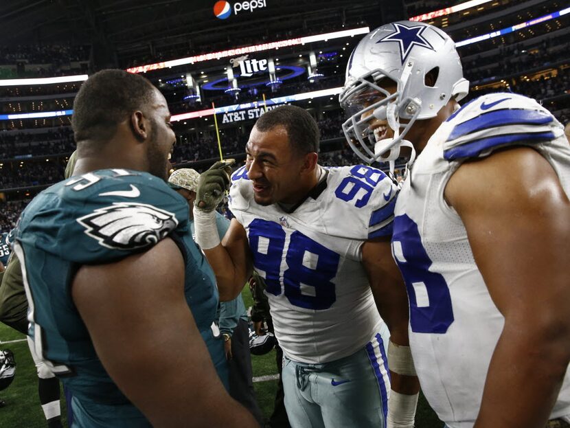 Dallas Cowboys defensive tackle Tyrone Crawford (98) and defensive end Jack Crawford...