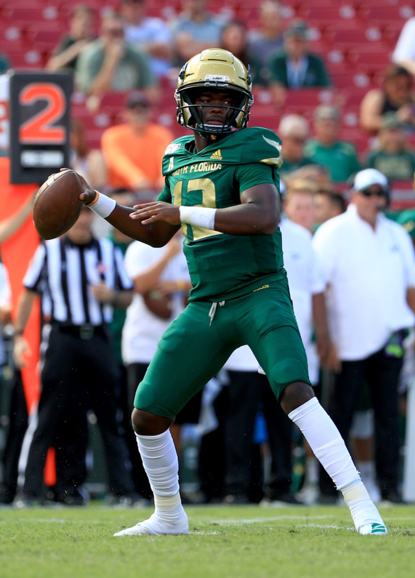 TAMPA, FLORIDA - SEPTEMBER 28:  Jordan McCloud #12 of the South Florida Bulls passes during...