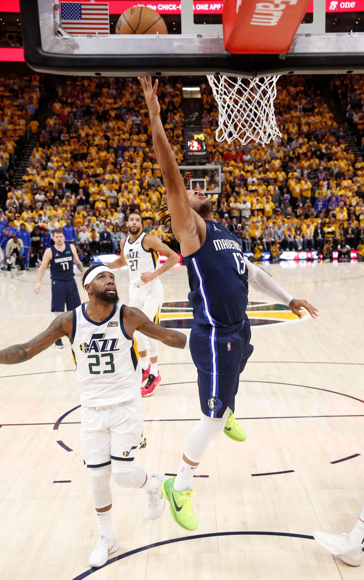 Dallas Mavericks guard Jalen Brunson (13) attempts a layup in front of Utah Jazz forward...