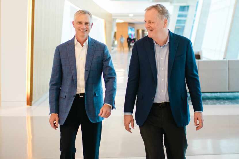 New American Airlines CEO Robert Isom walking with retiring CEO Doug Parker in December....