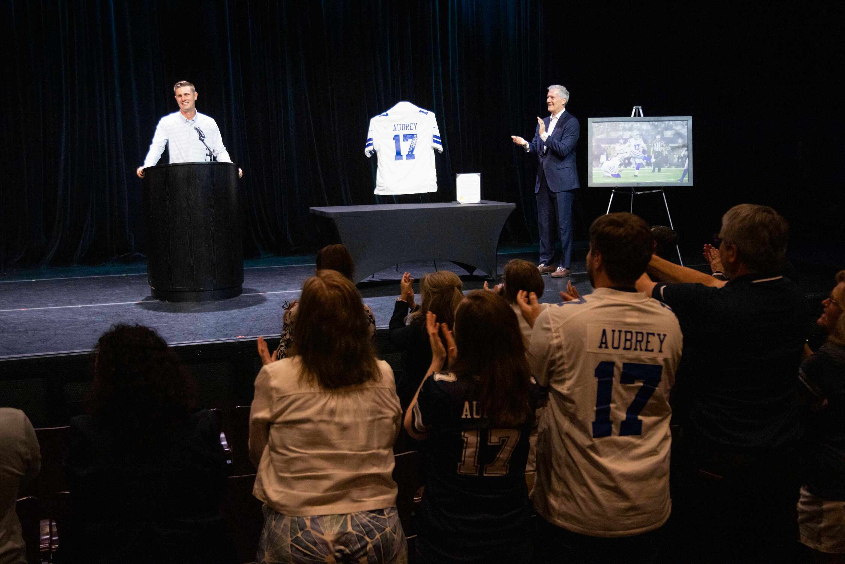 Plano native and Dallas Cowboys kicker Brandon Aubrey speaks after being presented the key...