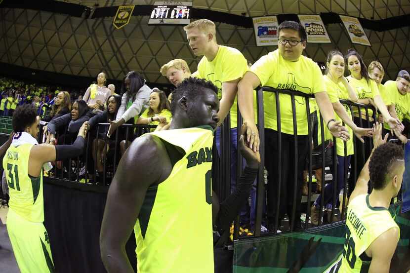 WACO, TX - FEBRUARY 18: Jo Lual-Acuil Jr. #0 of the Baylor Bears shakes hands with fans...