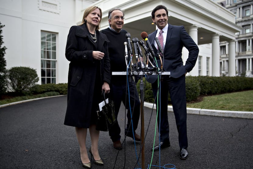 General Motors CEO Mary Barra, left, speaks with the media alongside Fiat Chrysler CEO...