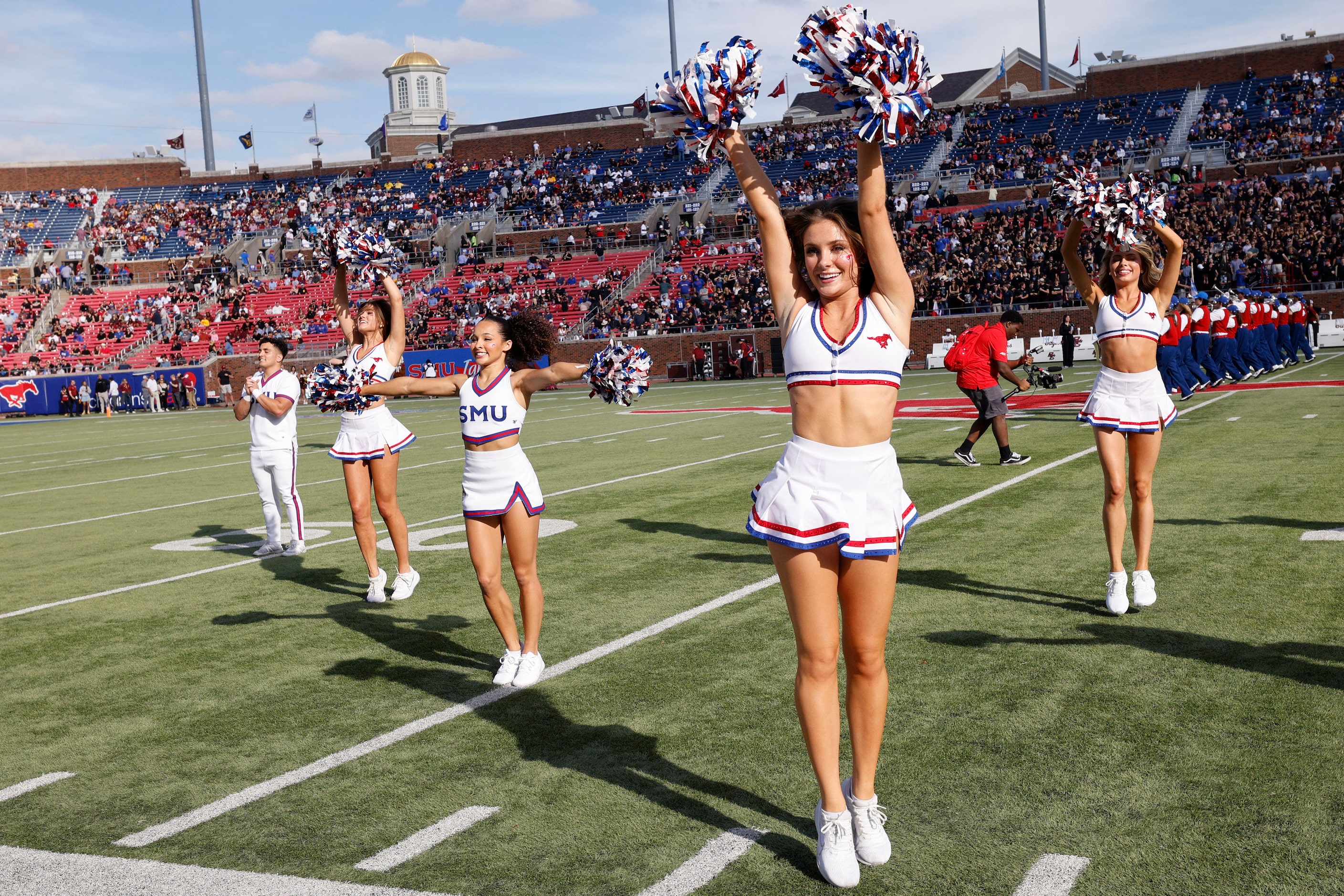 SMU cheerleaders perform before an NCAA college football game against the Boston College at...