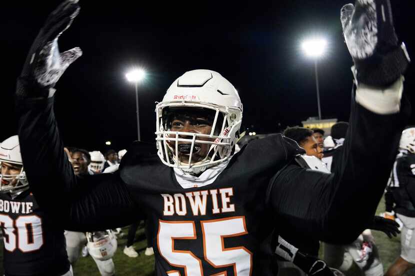 Arlington Bowie offensive lineman Rashid Wasai (55) celebrates after a victory over...