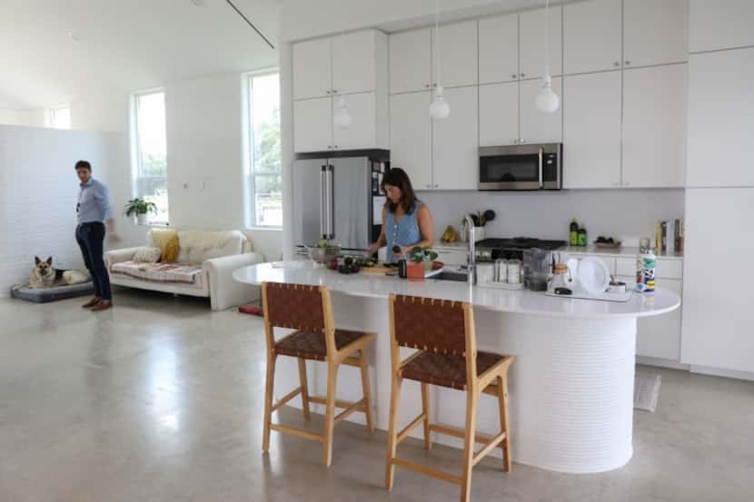 Lawrence Nourzad and Angela Hontas spend time in their newly purchased 3D-printed home in...