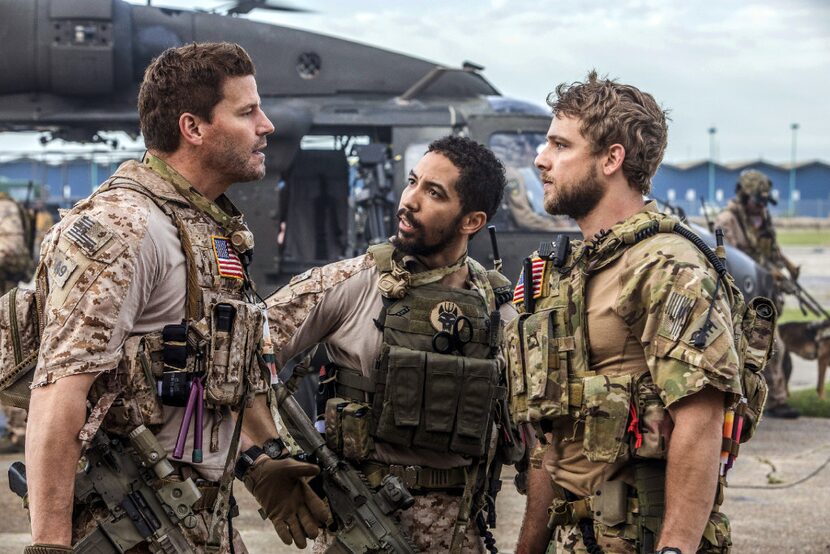 From left: David Boreanaz, Neil Brown Jr. and Max Thieriot in a scene from SEAL Team,...