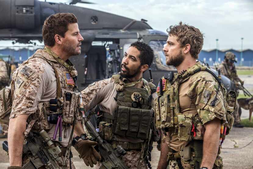 From left: David Boreanaz, Neil Brown Jr. and Max Thieriot in a scene from SEAL Team,...