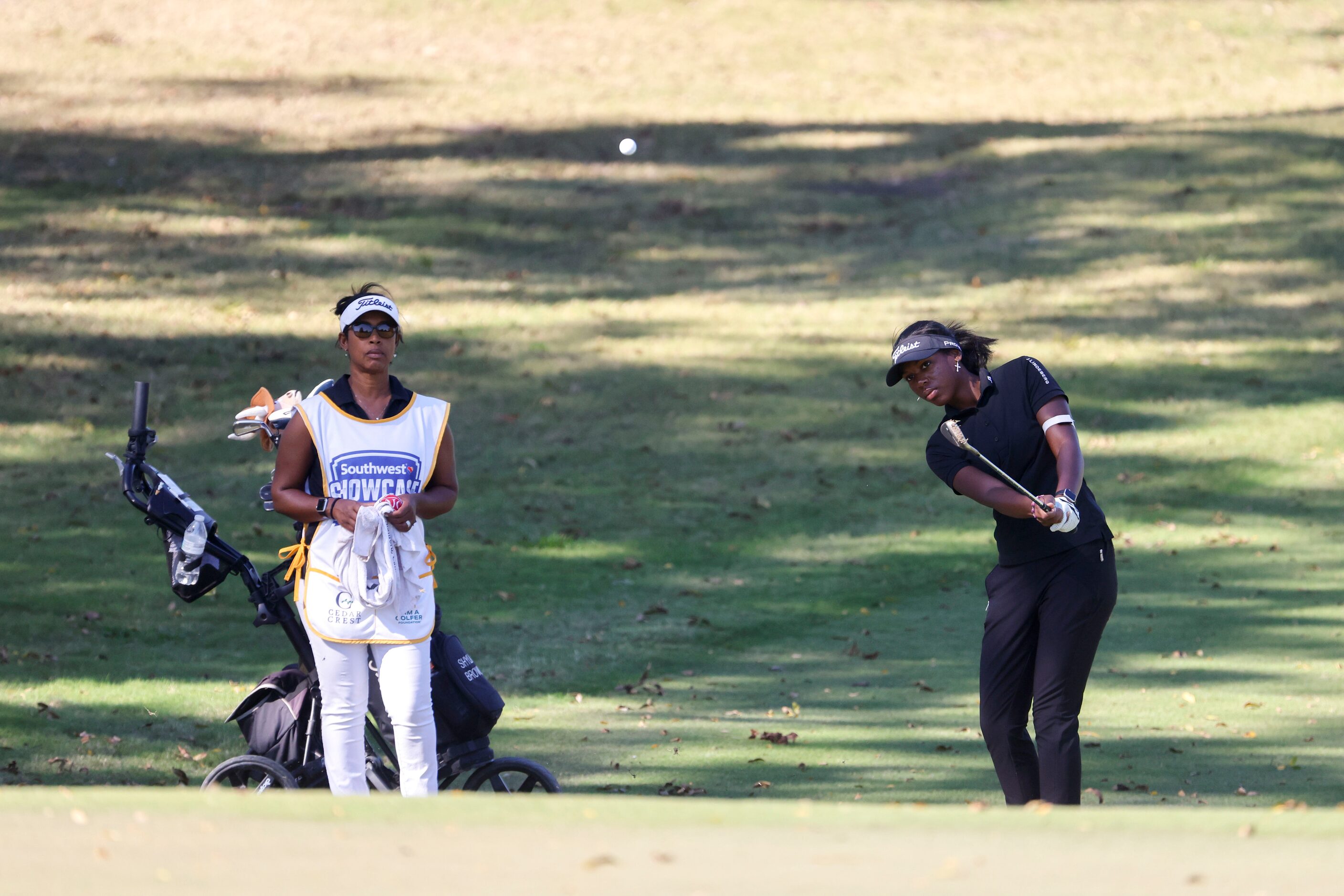 Shyla Brown of McKinney, hits on the first fairway during the Southwest Airlines Showcase...