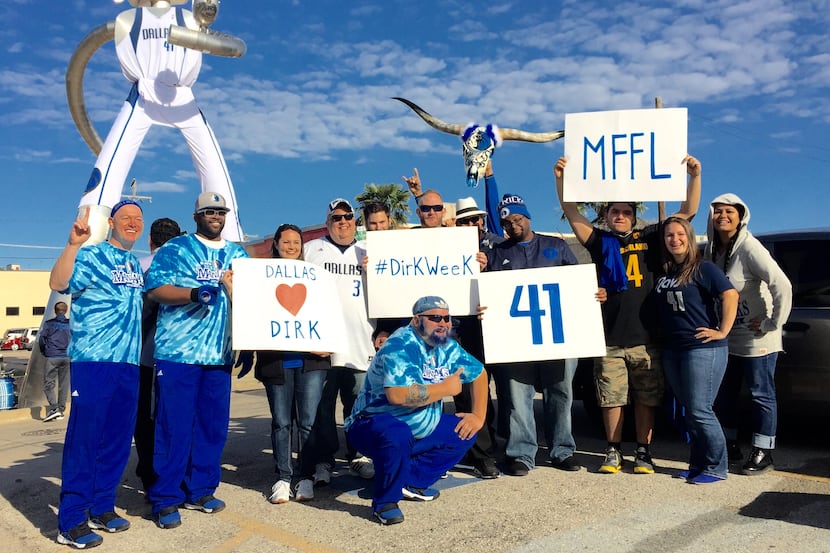 The Dallas Mavericks put a giant Mavs jersey on the famed Traveling Man statue at DART's...