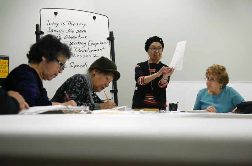 Amelia Barajas (second from right) teaches English at Catholic Charities’ Brady Center,...