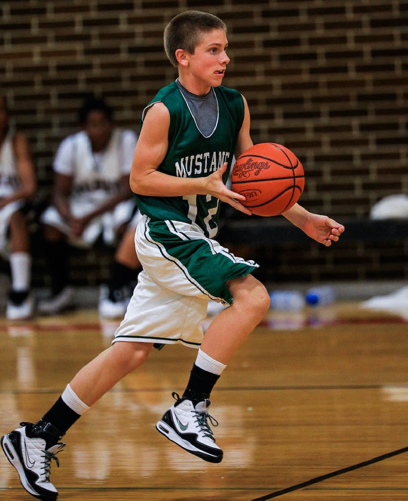 Shane Buechele playing basketball