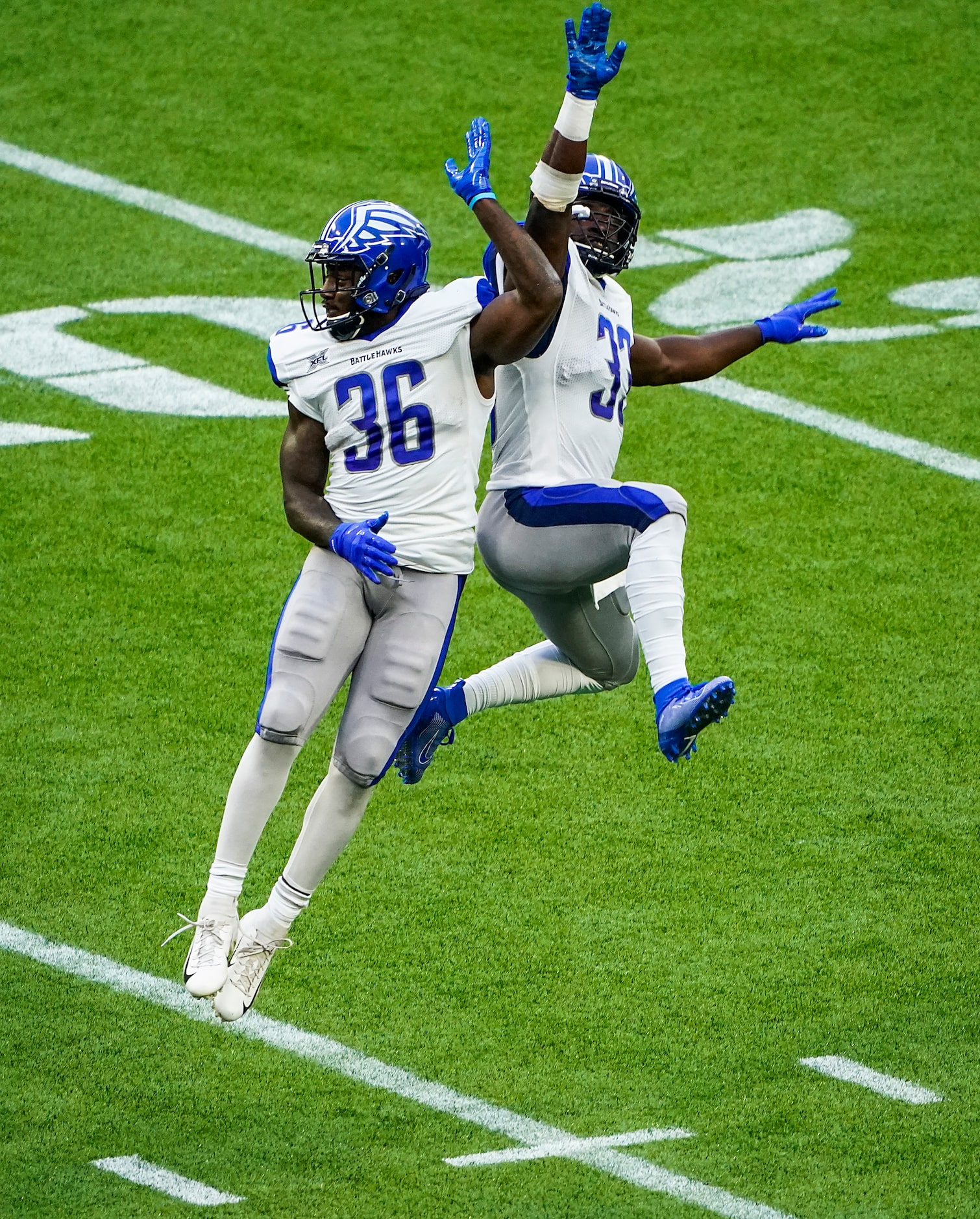 St. Louis Battlehawks running back Keith Ford (36) celebrates with running back Christine...