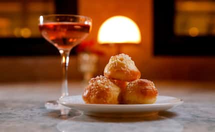 Gruyere gougères are paired with Perrier-Jouët Rosé at Coupes.