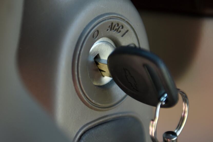 This Tuesday, April 1, 2014 file photo shows a key in the ignition switch of a 2005...