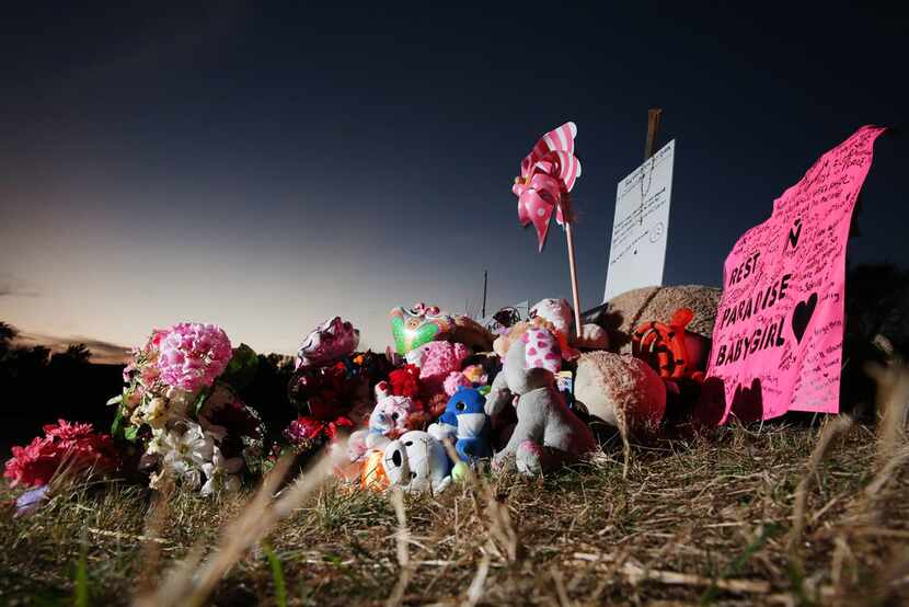 The growing memorial where the body of Sherin Mathews, 3, was found in a culvert near 703 S....