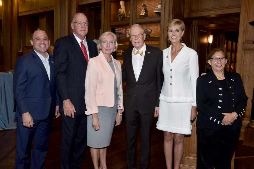 Christopher and Sue Bancroft (second and third from left) are joined by (from left) Nolan E....