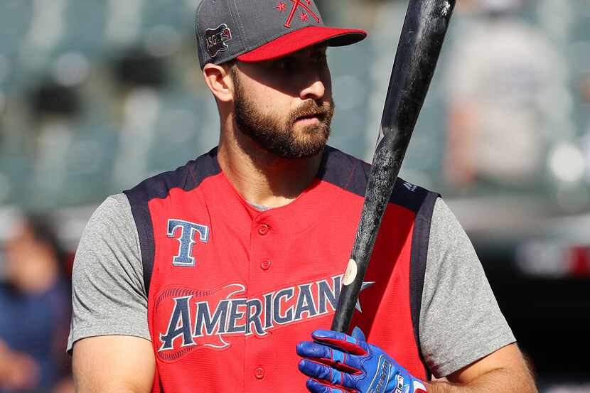 CLEVELAND, OHIO - JULY 09: Joey Gallo #13 of the Texas Rangers and the American League looks...