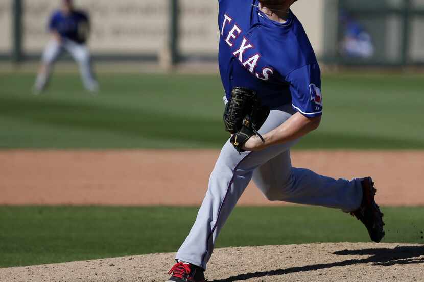 Texas Rangers pitcher Alec Asher pitches in the eight inning during a Major League Baseball...