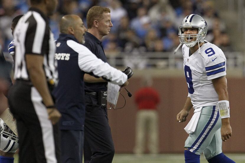 Dallas Cowboys quarterback Tony Romo (9) yells at the bench, directed at Dallas Cowboys wide...