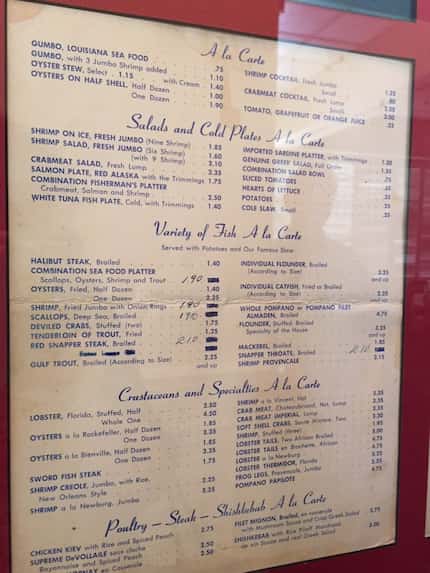  Vincent Seafood's menu from 1962 hangs on the wall. Check out the $4.75 lobster tails and...