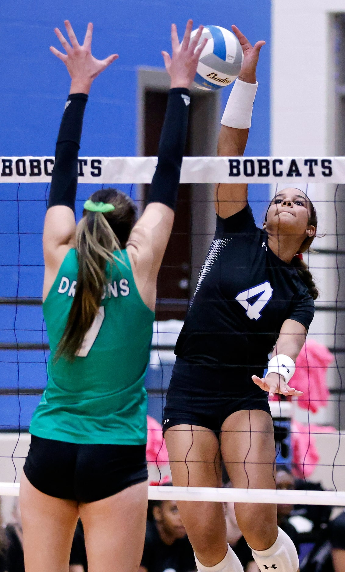 Trophy Club Byron Nelson outside hitter Sydnee Peterson (4) spikes the ball over Southlake...