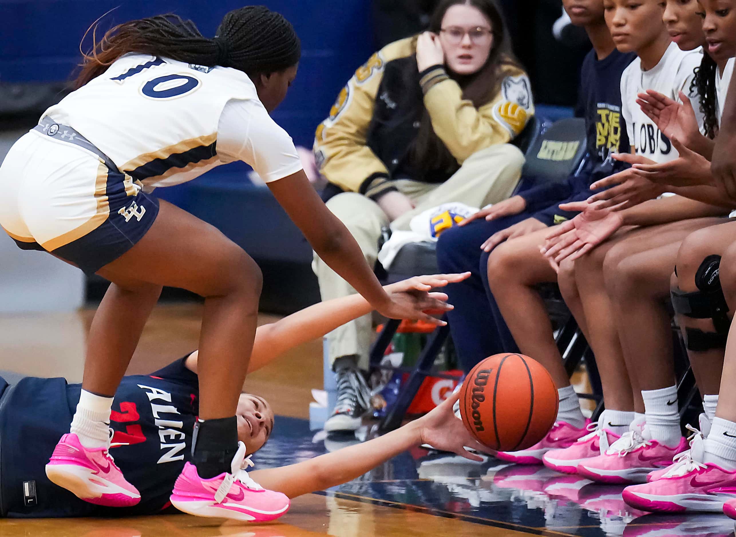 Allen’s Aryn Roberts (23) loses a loose ball out of bounds against Little Elm's Amina Diallo...