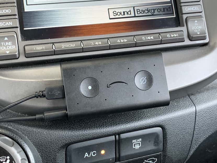 The Echo Auto in its spot under my car's navigation screen.