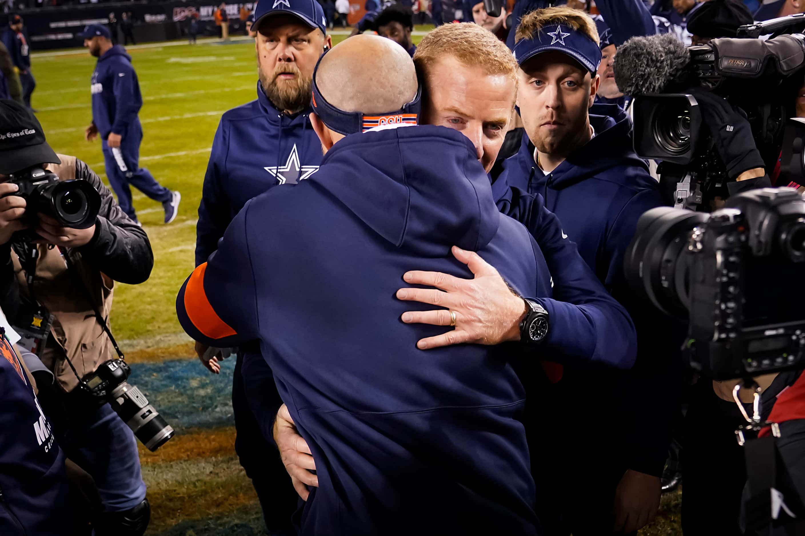 Dallas Cowboys head coach Jason Garrett hugs Chicago Bears head coach Matt Nagy after the...