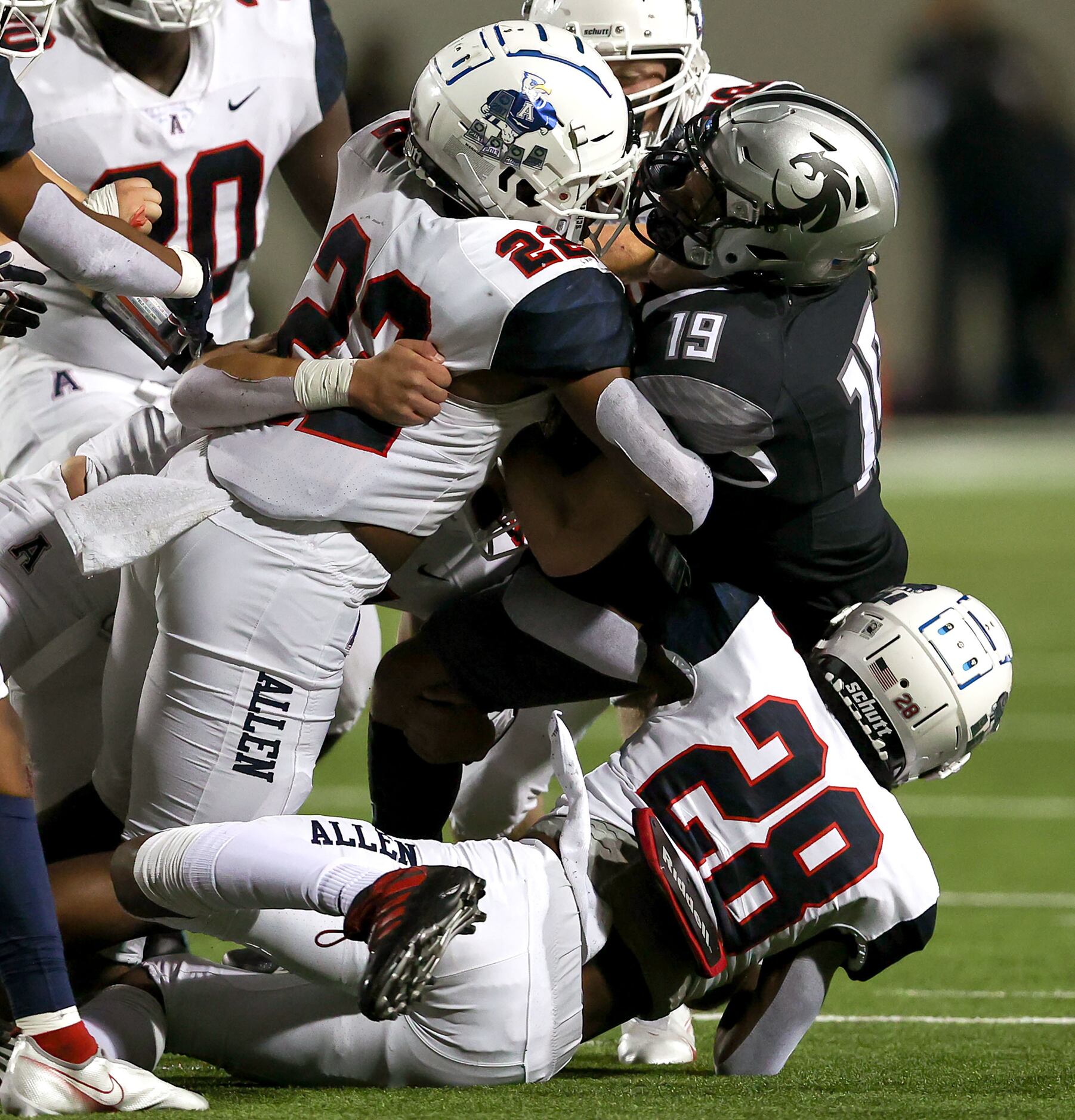 Denton Guyer wide receover Grayson O'Bara (19) gets stuffed after making a reception by...