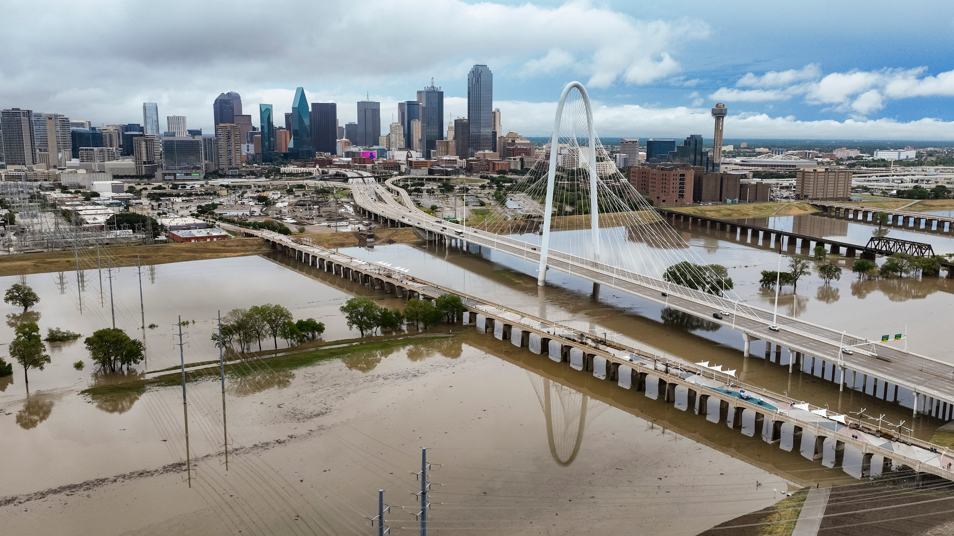 An aerial view of a swollen Trinity River in Dallas, Monday, August 22, 2022. 